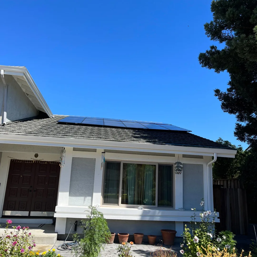 Clean solar panels on Dublin CA home rooftop after professional cleaning service, house exterior view