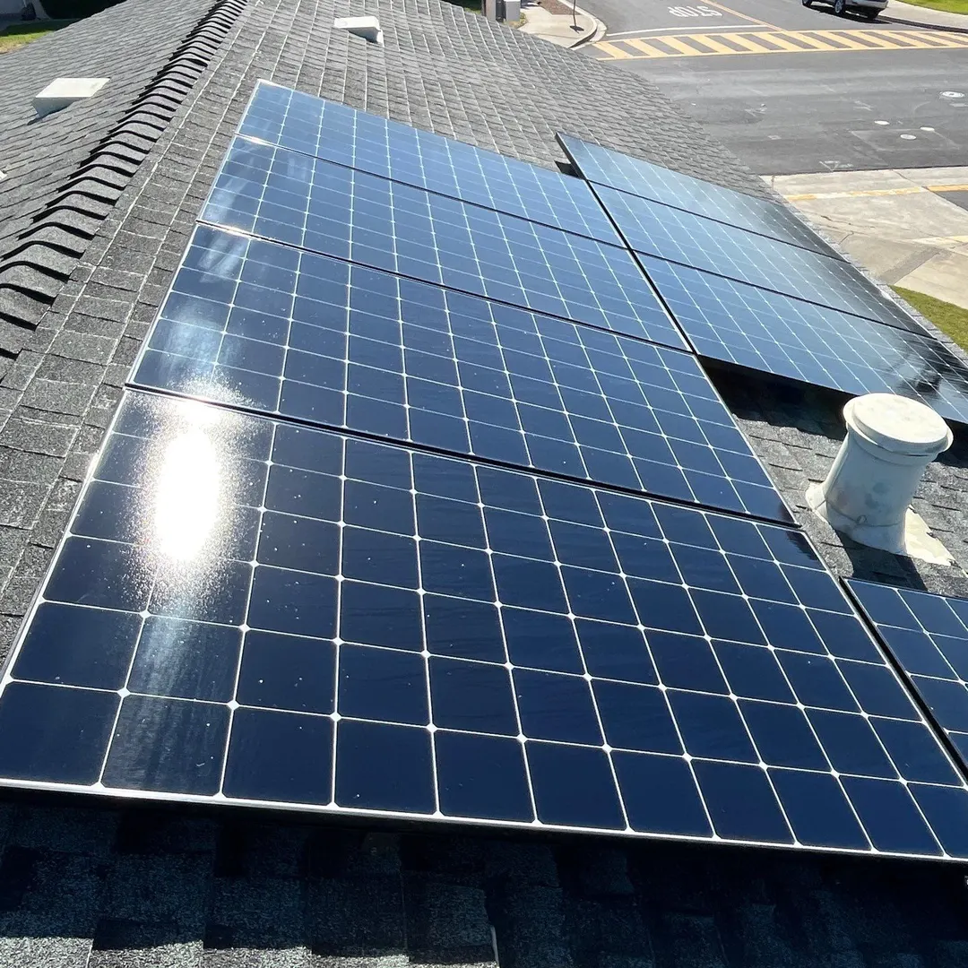 Solar panel cleaning in Dublin CA showing full rooftop array with neighborhood street view